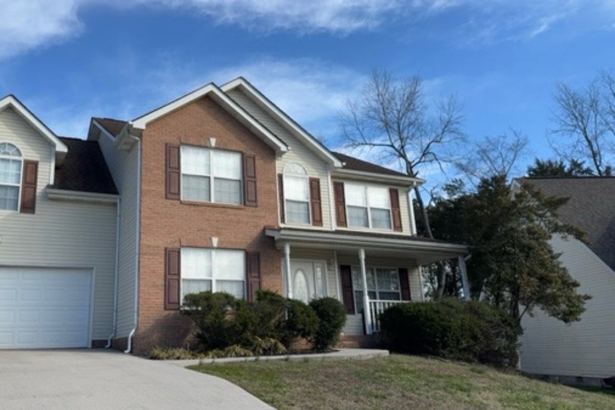 Freshly painted home exterior by EZ Plumbing & Repair serving Rochester NY